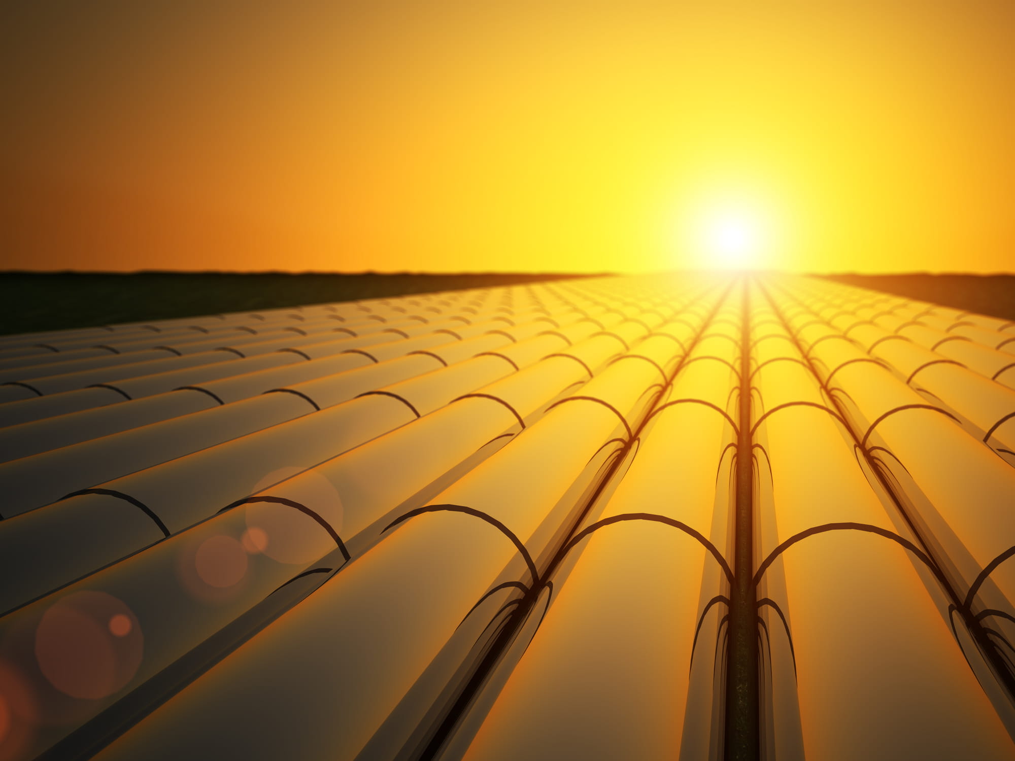 Gas pipelines at sunset
