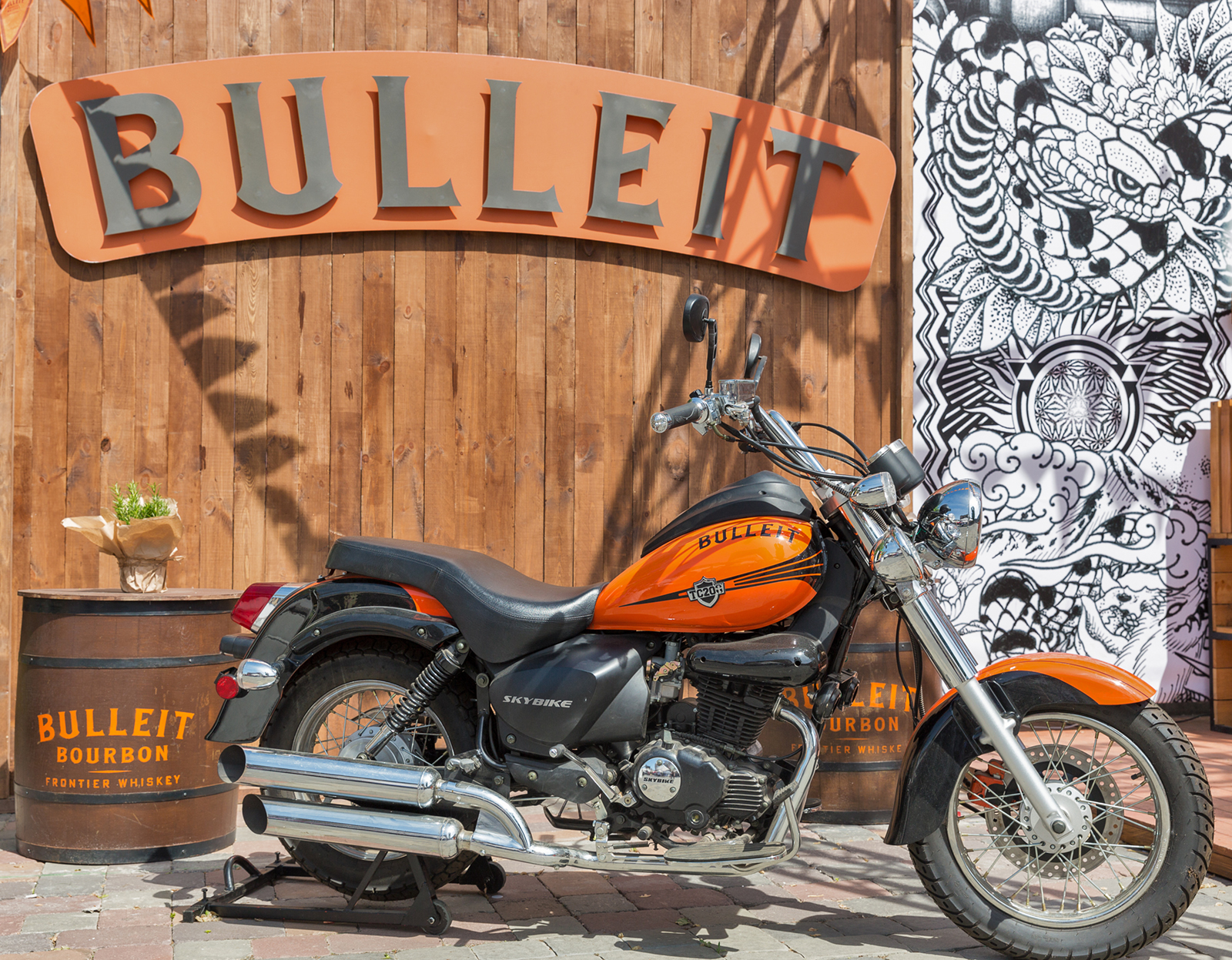 Motorcycle in front of Bulleit Bourbon distillery